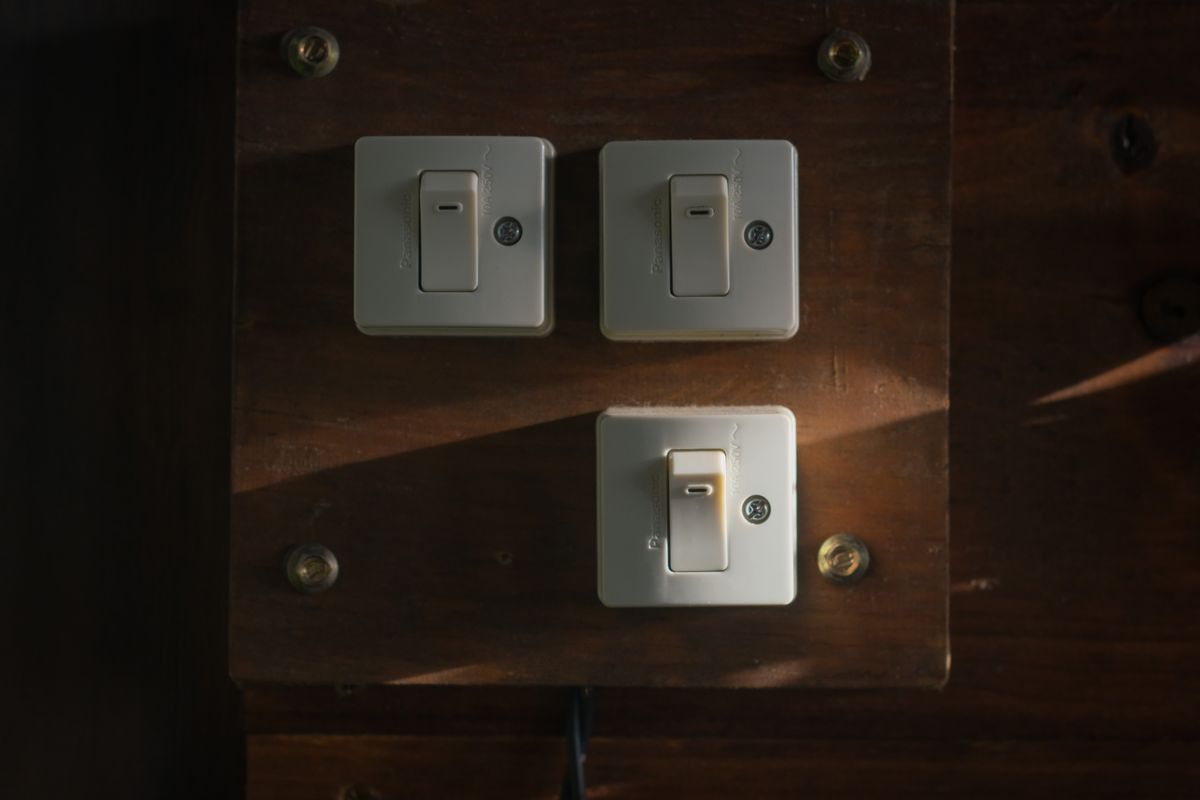 Vintage light switches and old wiring in an older Virginia Beach home