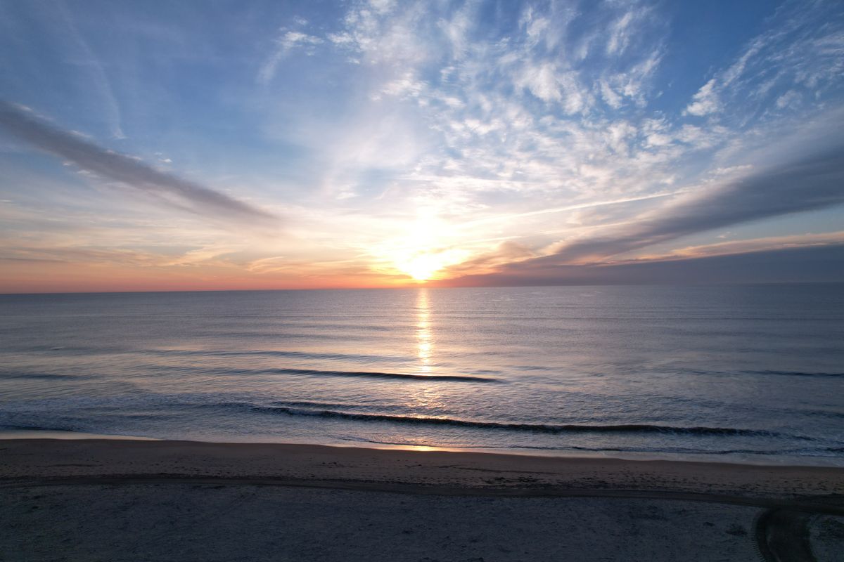 Waves along the shoreline near Sandbridge Beach in Virginia Beach, VA